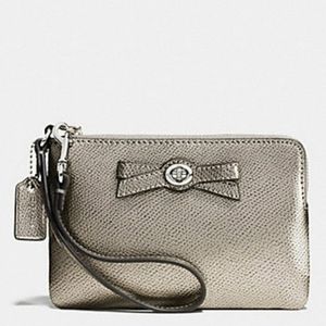 Coach Metallic wristlet hand bag